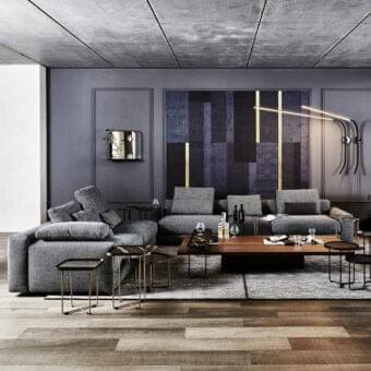 Sophisticated Arketipo Atlas sectional with textured medium gray textile upholstery and angular form