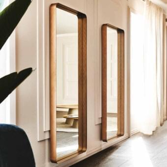 Elegant Cattelan Italia Wish S mirror, a wall-mounted accent with a slender rectangular silhouette and brushed bronze finish