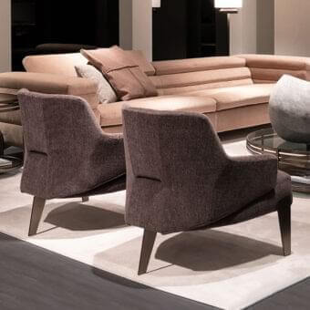 Distinguished Arketipo Nascar lounge chair with dark brown textured fabric upholstery and black nickel metal structure