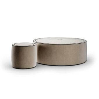 Refined Reflex Aura ottoman with neutral beige fabric upholstery and detailed crossed stitching