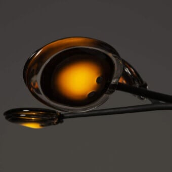 Captivating Bocci 16 Armature ceiling lamp with sequentially layered molten glass in warm amber and golden tones with a glossy finish