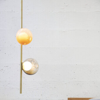 Elegant Bocci 28 Stem Ceiling Lamp with gradient pale orange to clear glass spheres and brass finish