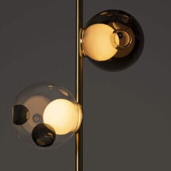 Superior Bocci 28 Stem Ceiling Lamp with brass finish and uniquely distorted clear glass spheres encasing a milk white lamp holder