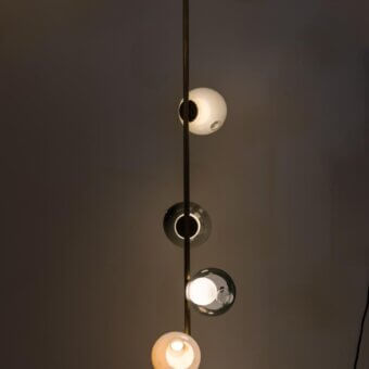 Superior Bocci 28 Stem Floor Lamp with a slender metal stem and distorted clear glass spheres in brushed brass finish