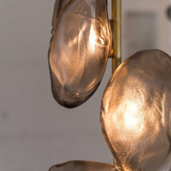 Luxury Bocci 73 Stem Floor Lamp with organically shaped shades and a satin metal support in golden-bronze with brass finish