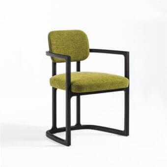 Elegant Porada Serena armchair with olive green upholstery and matte dark gray metal frame crafted in solid ash wood