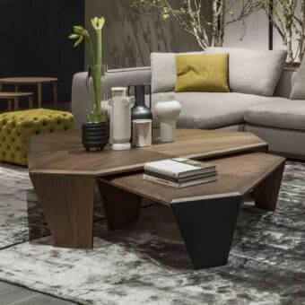 Distinctive Porada Tortuga coffee table crafted in canaletto walnut with inlaid veneer and satin finish, presenting a unique three-leg structure