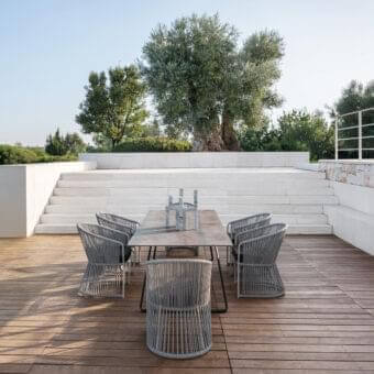 Elegant Varaschin Tibidabo armchair with Perla Brown Rope weaving and gray structure for outdoor spaces