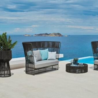 Lavish Varaschin Tibidabo high sofa crafted with dark brown synthetic fiber and light gray fabric cushions with a painted metal frame