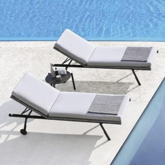 Distinguished Varaschin Bahia lounger with a dark gray powder-coated aluminum frame and light gray VAR#TEX upholstery