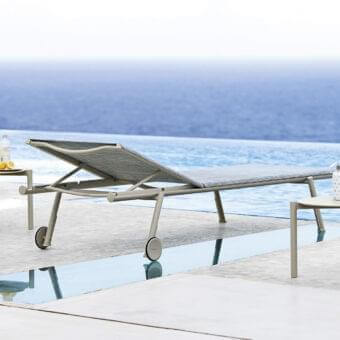 Distinguished Varaschin Bahia lounger with light-grey powder coated aluminum and VAR#TEX mesh exhibiting clean lines