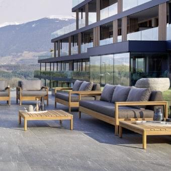 Exceptional Varaschin Bali coffee table crafted in Italy with plantation certified solid teak wood and warm toned finish