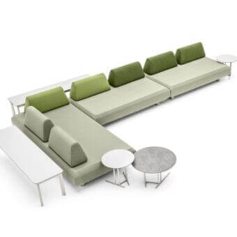 Distinguished Varaschin Bento sectional with okume wood frame, aluminum feet, and muted sage green textile upholstery complemented by darker green cushions