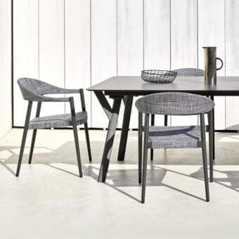 Sophisticated Varaschin Clever armchair with aluminum frame and VAR#TEX fabric upholstery in a subtle gray and white pattern