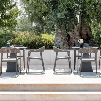 Distinguished Varaschin Clever armchair with dark gray textilene and synthetic cord woven seat and backrest in powder-coated aluminum