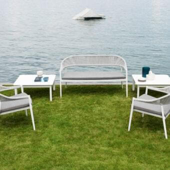 Distinguished Varaschin Clever bench with a powder-coated aluminum frame and durable VAR#TEX technical fabric seat built with a synthetic cord back