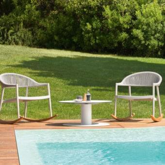 Exceptional Varaschin Clever rocking lounge chair with woven textilene seat and Iroko wood runners crafted in Italy