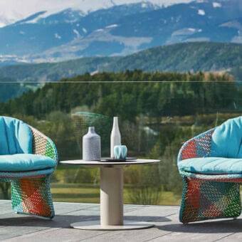 Distinguished Varaschin Maat lounge chair with vibrant hand-woven synthetic fibers and powder-coated aluminum frame