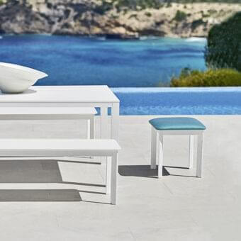 Distinguished Varaschin System bench with a matte white rectangular seat and powder-coated aluminum frame