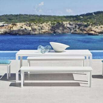 Superior Varaschin System bench with bright fabric padding and powder-coated aluminum structure for elegant outdoor use