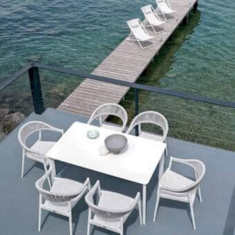 Elegant Varaschin System table with powder-coated aluminum structure and HPL top in bright white finish