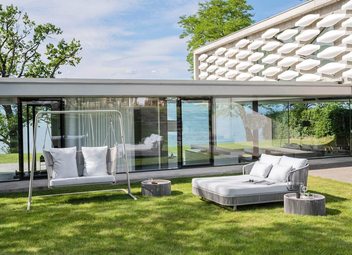 Exceptional Varaschin Tibidabo lounger with Silk Grey aluminum and Perla Rope weaving offers a relaxing, stylish outdoor retreat with plush white cushions