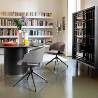 Elegant Potocco Velis armchair crafted in Italy with matte grey molded shell and black metal five-star base