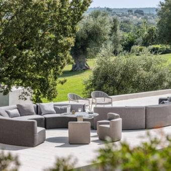 Superior Varaschin Belt sectional with solid okumé wood structure and medium gray woven textile offering a modular design