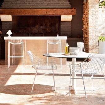 Distinguished Varaschin Summer Set bistrot table with solid white tabletop and powder coated steel base crafted in Italy
