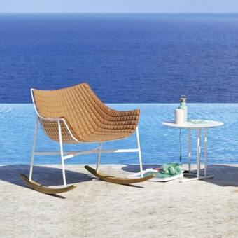 Refined Varaschin Summer Set rocking lounge chair with white powder-coated steel frame and brownish-tan quilted textile cushions