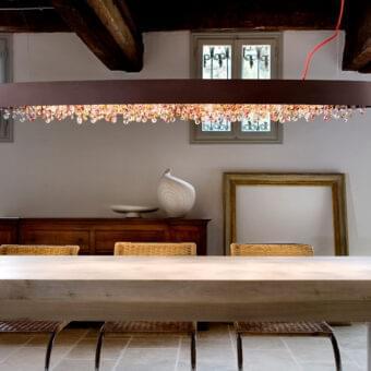 Distinguished Masiero Olà Ovale suspension lamp with burnished metal and warm amber coated Italian glass pendants