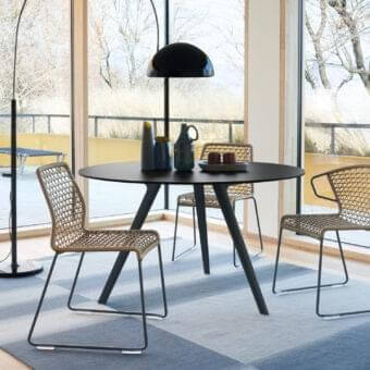 Exceptional Potocco Katana indoor table with matte black embossed painted metal base and smooth circular tabletop