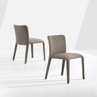 Distinguished Potocco Lars chair fully upholstered in high-end taupe fabric with a matte finish and integrated legs