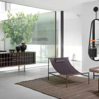 Elegant Potocco Sen sideboard crafted with ash in a dark matte stain and bronzed glass sliding doors concealing shelves