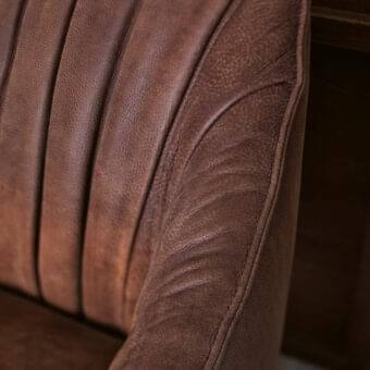 Lavish Potocco Blossom sofa upholstered in textured brown leather with curved armrests and a solid ash wood base
