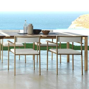 Distinguished Talenti Casilda armchair with golden powder-coated stainless steel, stone-effect armrests and durable beige textile upholstery