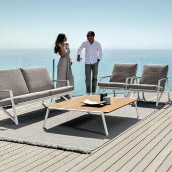 Elegant Talenti Cottage coffee table with iroko wood top and matte white aluminum frame crafted in Italy