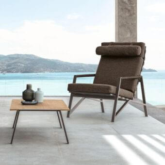 Refined Talenti Cottage lounge chair with a muted brown textured textile and powder-coated aluminum frame