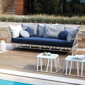 Distinctive Roberti Rattan Hamptons Graphics sofa with powder-coated aluminum and deep blue woven textile cushions crafted for outdoor lounge spaces