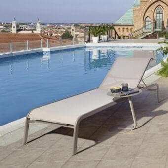 Elegant Roberti Rattan Key West side table crafted with powder-coated aluminum and a Cipria finish