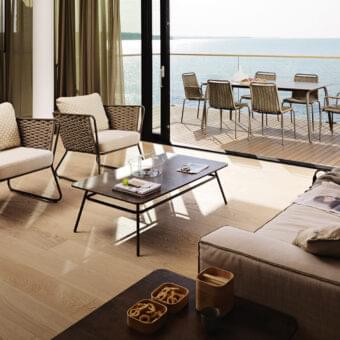 Exceptional Roberti Rattan Portofino lounge chair with a powder-coated aluminum frame woven in Nautic Rope and beige cushions