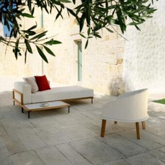 Distinguished Talenti Cleo coffee table with wood structure and light-colored marble top in a natural finish