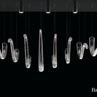 Distinguished Barovier&Toso Swing ceiling lamp crafted in clear textured Murano glass with thin steel cables and chrome spotlights