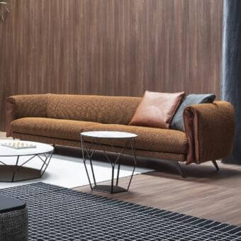 Distinguished Bonaldo Saddle sofa with uniquely shaped back and armrests in earthy brown woven fabric and dark brown leather