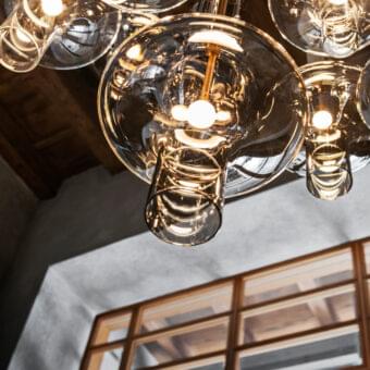 Superior Penta Wonder suspension lamp with clustered transparent borosilicate glass shades and brushed metal structure