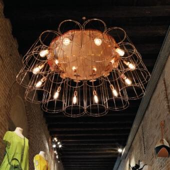 Exceptional Modo Luce Florinda Desnuda suspension lamp crafted in rose-gold metallic wire with exposed carbon filament bulbs
