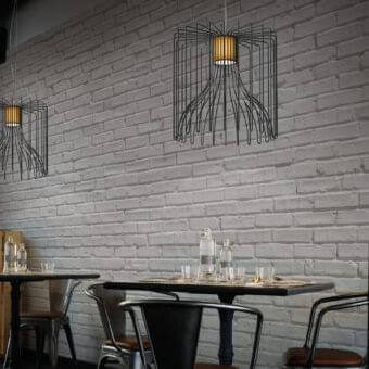 Exceptional Modo Luce Icaro suspension lamp with geometric steel wire body and matte black finish