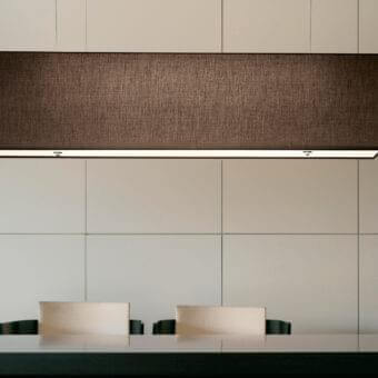 Elegant Modo Luce Rettangolo suspension lamp with textured dark brown textile and refined fabric upholstery crafted in Italy