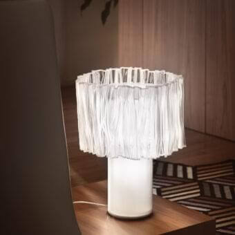 Superior Slamp Accordeon table lamp with a unique frilled lampshade crafted in bright white hand-moulded Lentiflex®