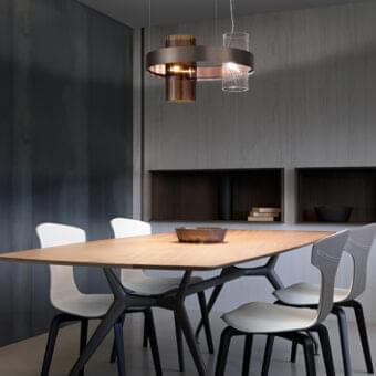 Exceptional Vistosi Armonia suspension lamp with a dark bronze metal ring and glass cylinder diffusers in clear textured and translucent brown tones
